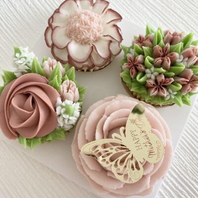 Vanilla cupcakes with buttercream florals.