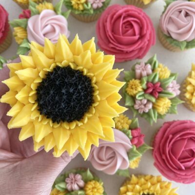 Vanilla cupcakes with buttercream florals.